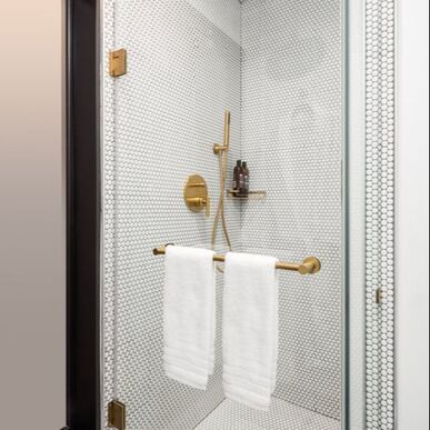 Shower with penny-tile at The Godfrey Hotel Hollywood